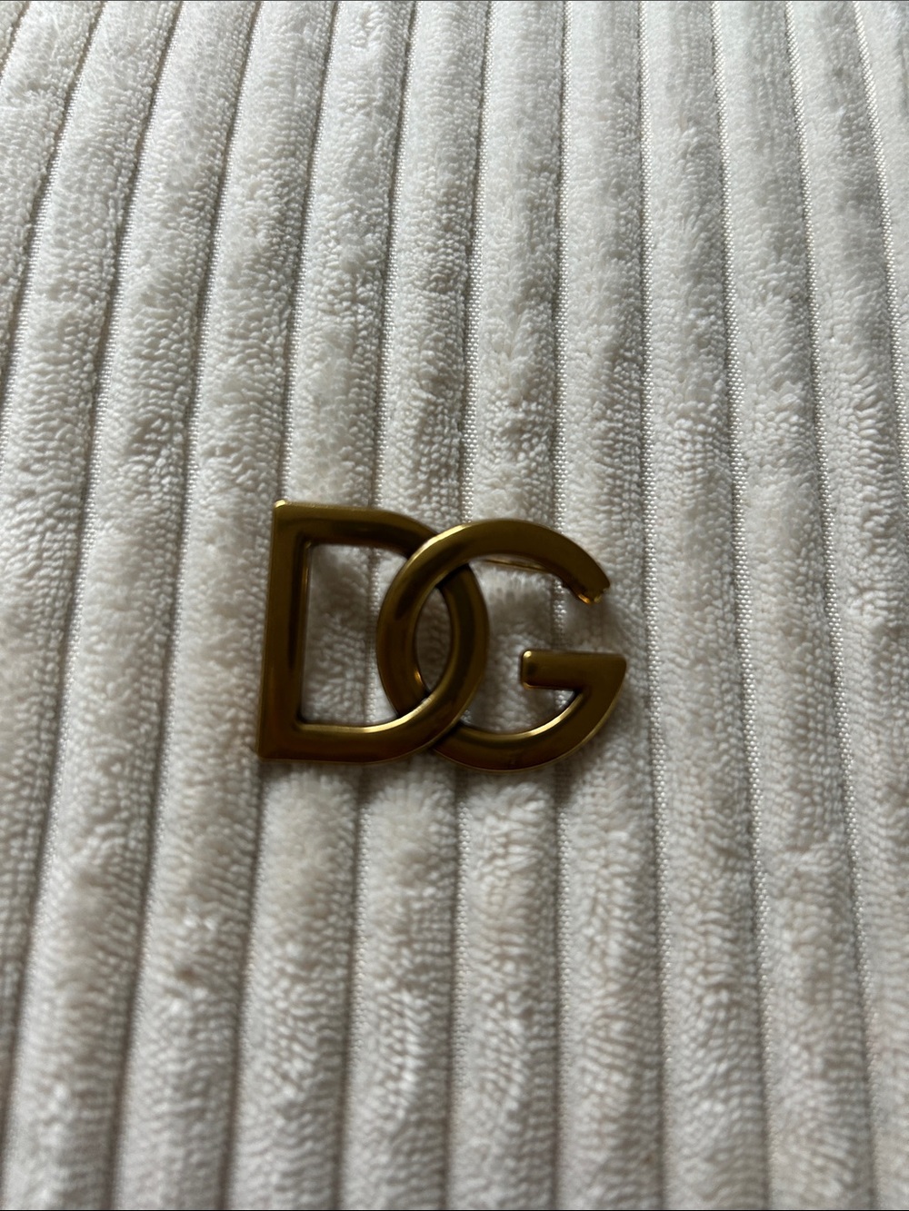 048. DG Antique Gold-Tone Stamped Logo Brooch.